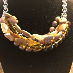 Custom made necklace with multiple tones of brown tan and bronze stones